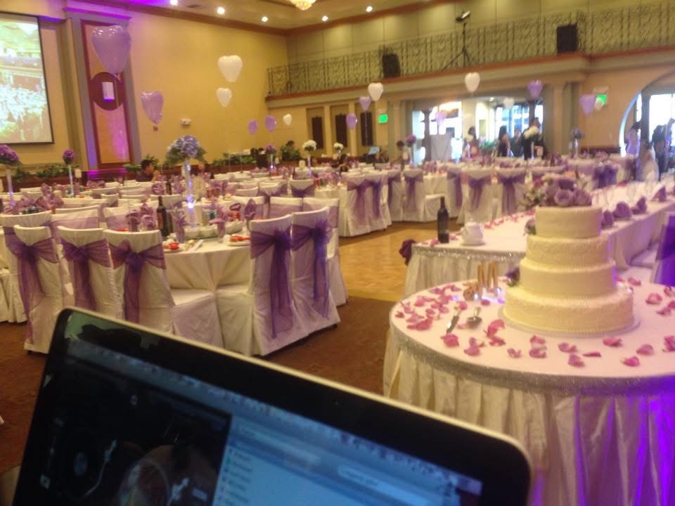 Decorated wedding reception and tiered cake
